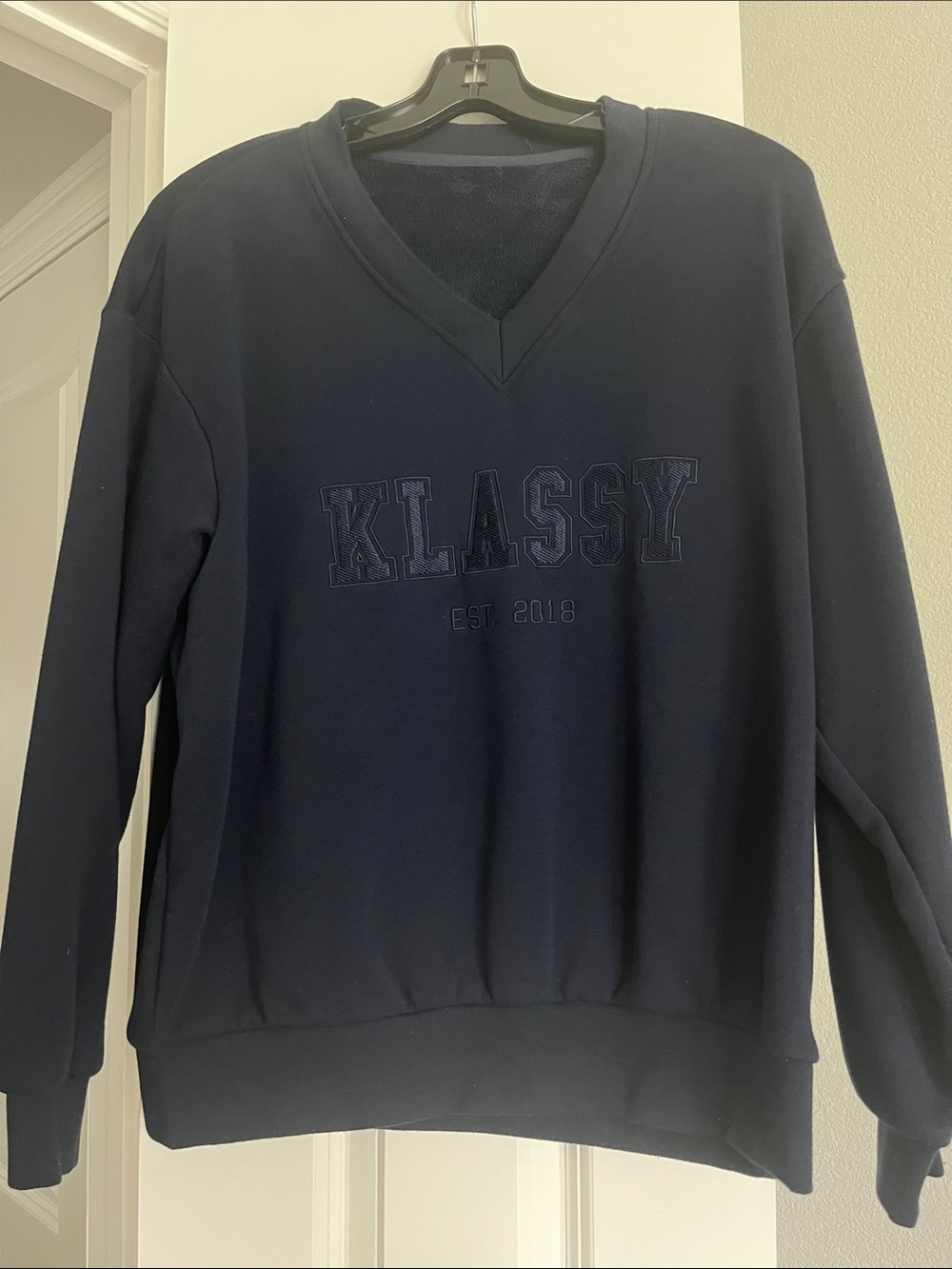 Klassy Network Navy V‑Neck Sweatshirt with Embroidered Logo